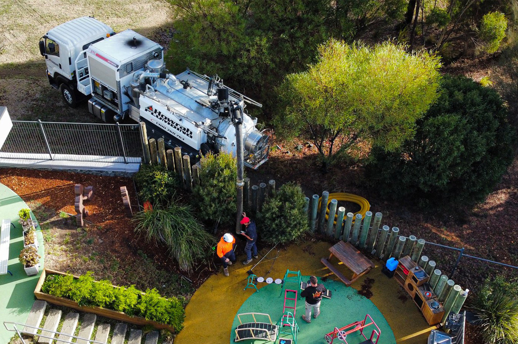 What is the role of a licensed plumber in maintaining safe water systems in Hobart?